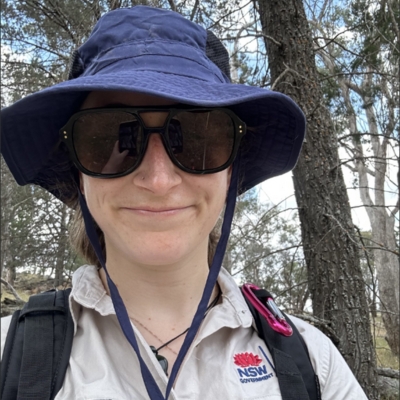 A close up of Hannah working in the field