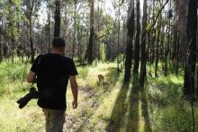 Landholder Jimmy Malecki and his dog, Junior